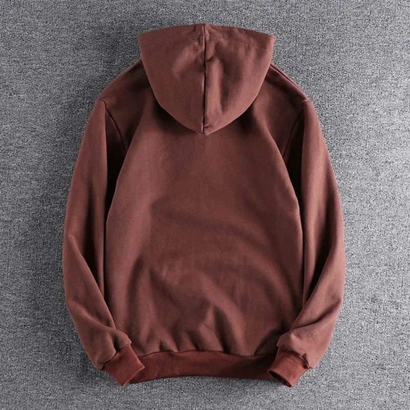 Stylish men's quarter-zip pullover hoodie, relaxed fit, ideal for streetwear & versatile outerwear.