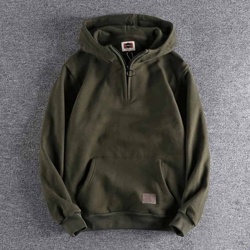 Versatile men's relaxed fit quarter-zip hoodie, perfect for cozy everyday comfort & casual style.