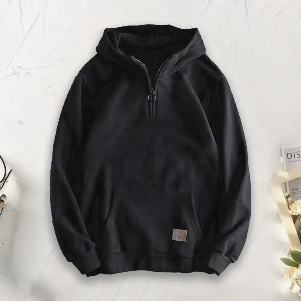 Man wearing a relaxed fit quarter-zip hoodie, perfect for casual wear, comfort & everyday style.