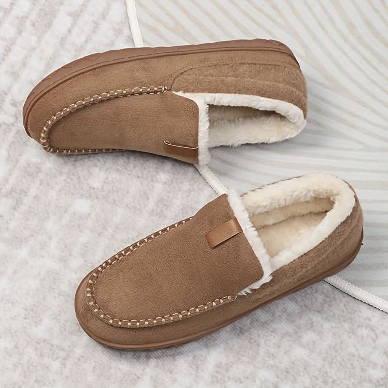 Comfortable men's indoor shoes, stylish slip-on design for supreme winter home comfort and lounging.
