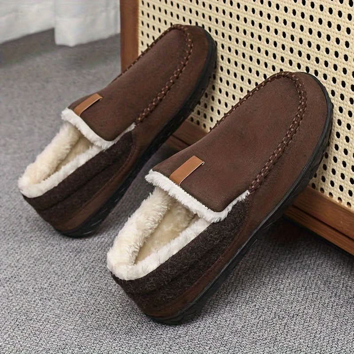 Close-up of the plush lining inside men's cozy slip-on house shoes, designed for ultimate indoor comfort.
