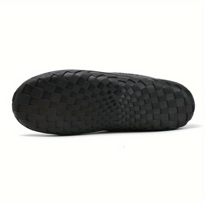 Men's comfortable slip-on house shoes with a durable sole, perfect for indoor and home use, year-round.