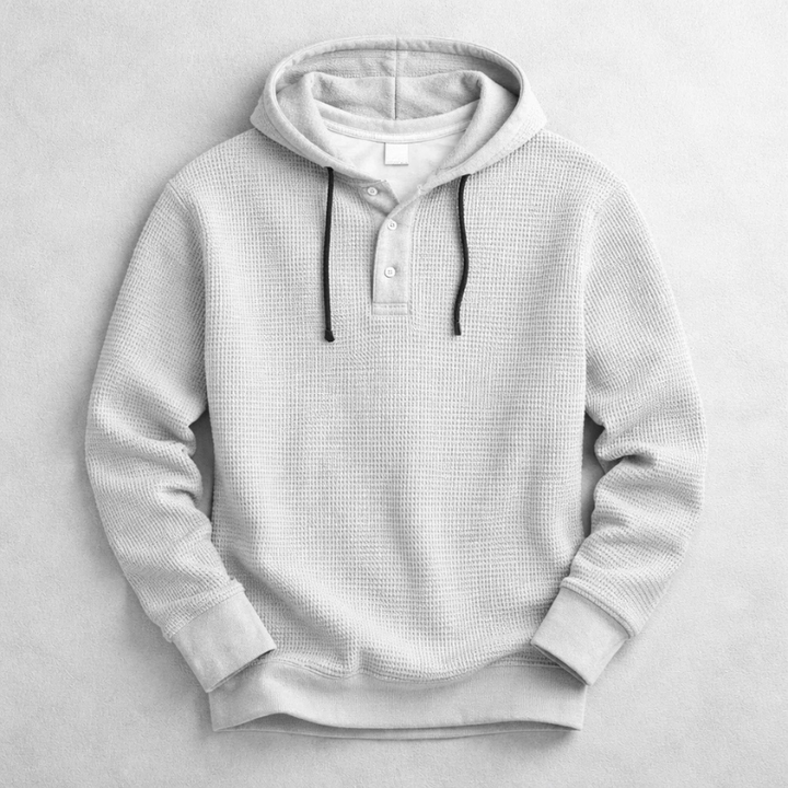 Tailored fit men's waffle knit Henley hoodie. Perfect layering piece for casual & everyday comfort.