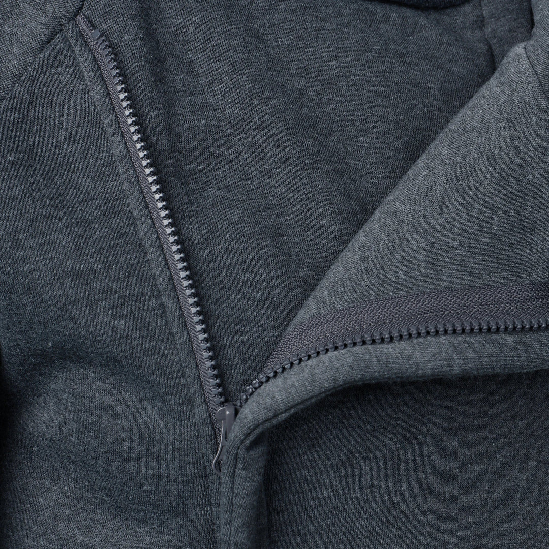 Modern urban men's crossover zip hoodie, offering an athletic slim-fit for casual wear.