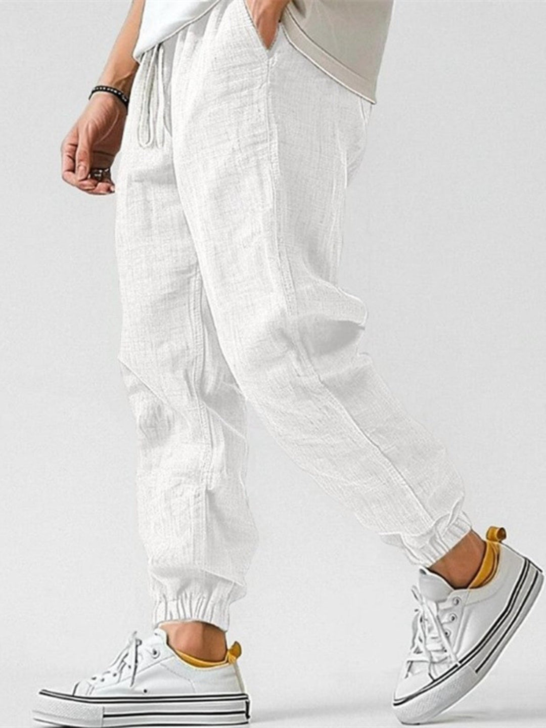 Effortless style men's track pants. Relaxed fit cuffed joggers, ideal for travel & spring fashion.