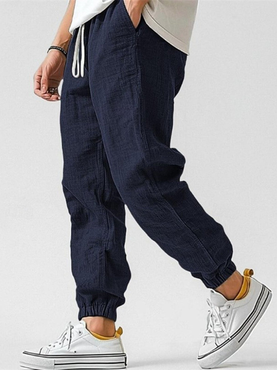 Spring fashion men's track pants. Relaxed fit cuffed joggers with drawstring for ultimate comfort & style.