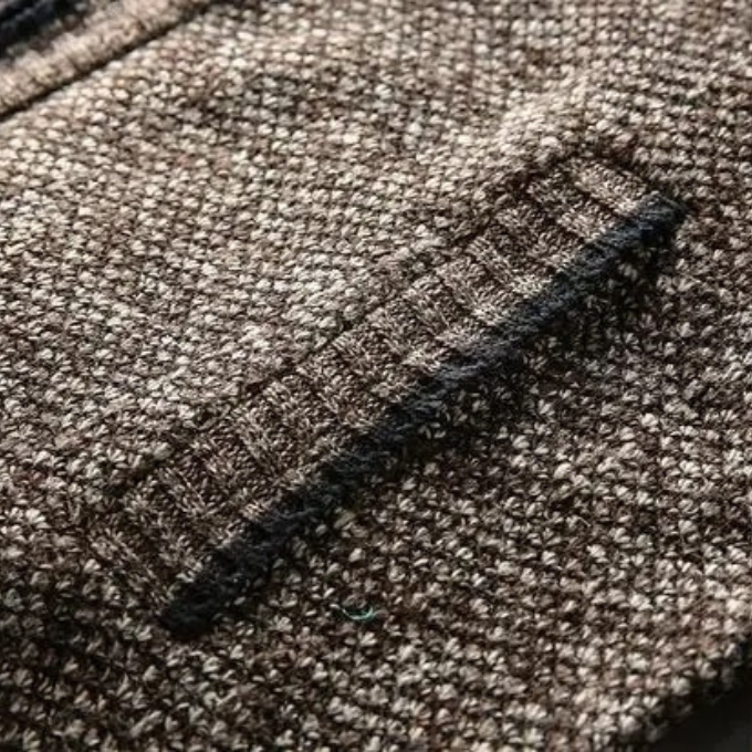 Stylish men's Cumberland winter coat, a warm fleece jacket for cold weather fashion.