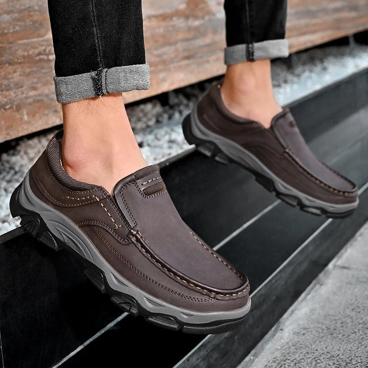 Men's Dakota slip-on loafers in a casual setting, comfortable brown footwear for everyday.