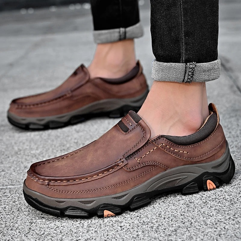 Top down view of men's black Dakota slip-on loafers, highlighting casual, comfortable style.
