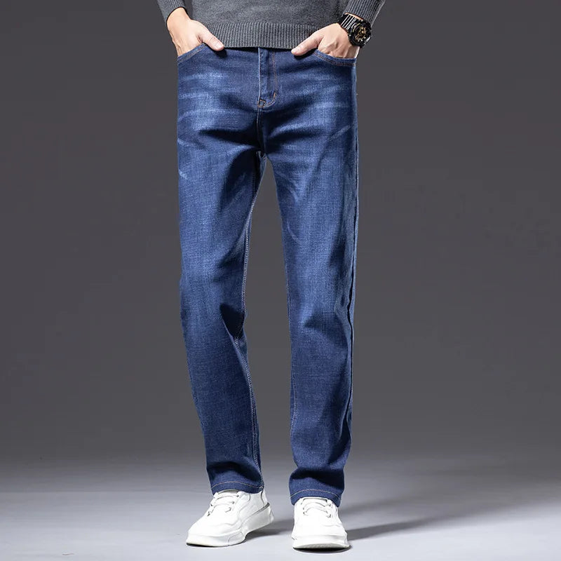 Men's dark blue stretch denim jeans, relaxed fit for comfort & casual style.