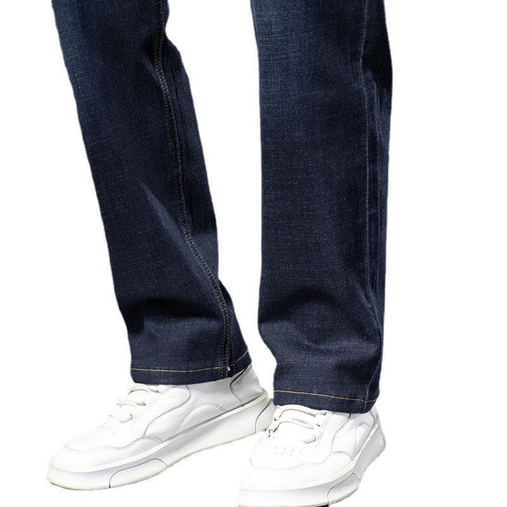 Men's dark wash stretch denim jeans, offering all-day comfort & a modern look.
