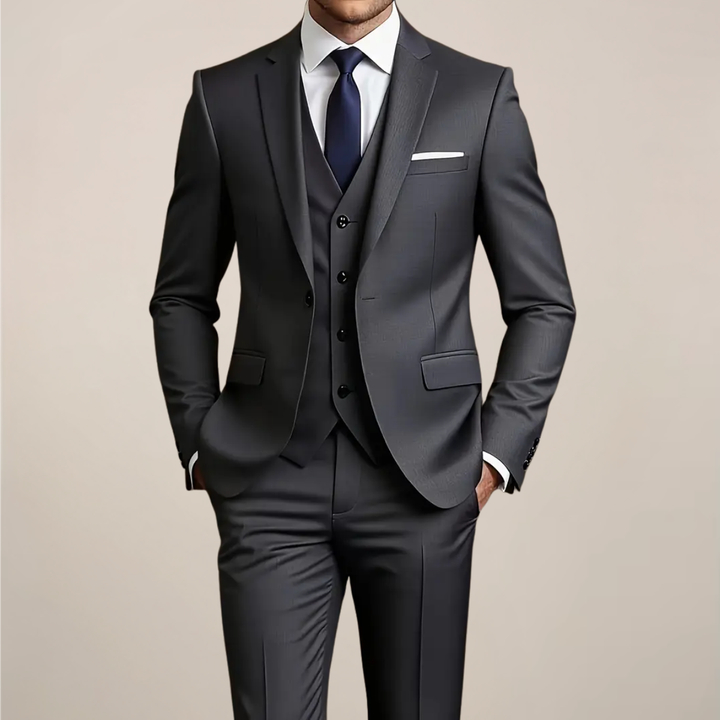 Men's dark grey slim fit three-piece suit. Ideal formal wear for weddings, business events & special occasions.