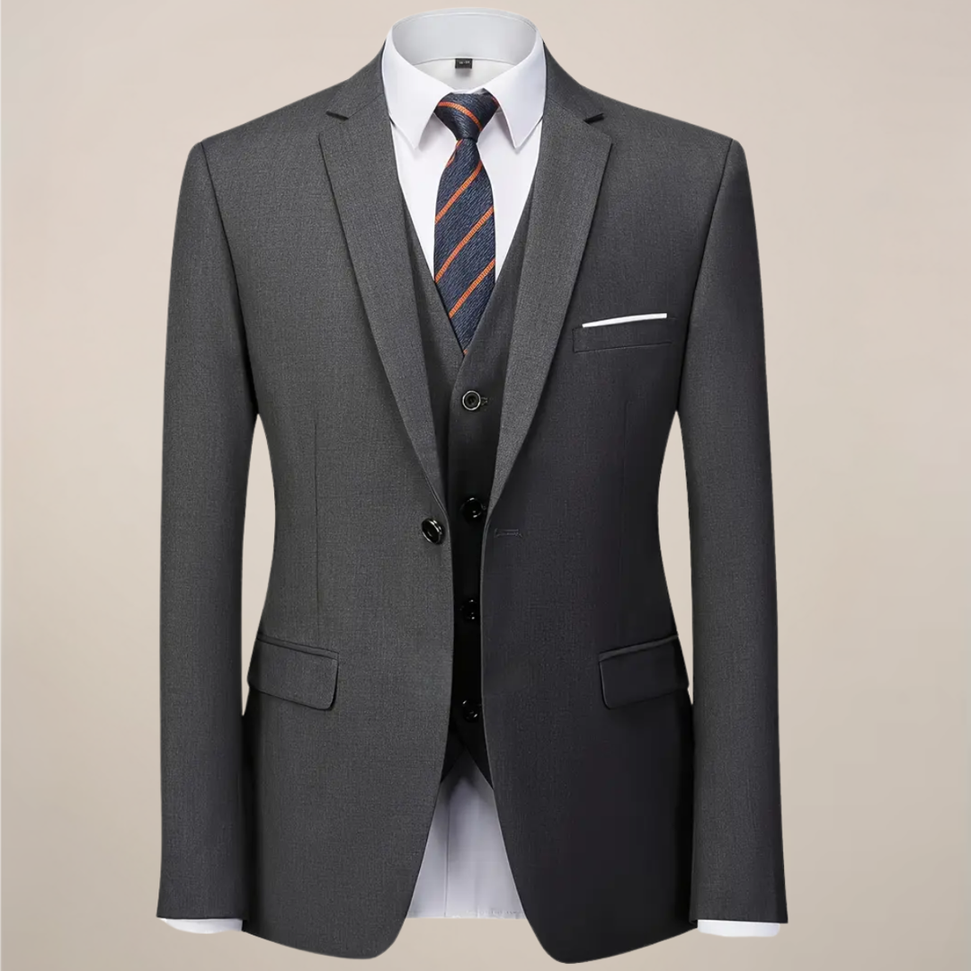 Stylish men's dark grey slim fit suit with waistcoat. Perfect tailored formal wear for events & business.