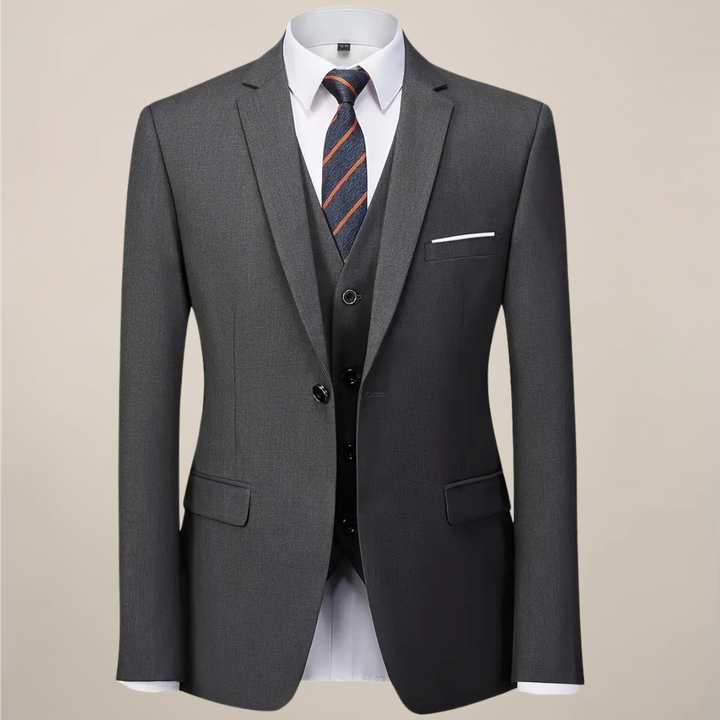 Stylish men's dark grey slim fit suit with waistcoat. Perfect tailored formal wear for events & business.