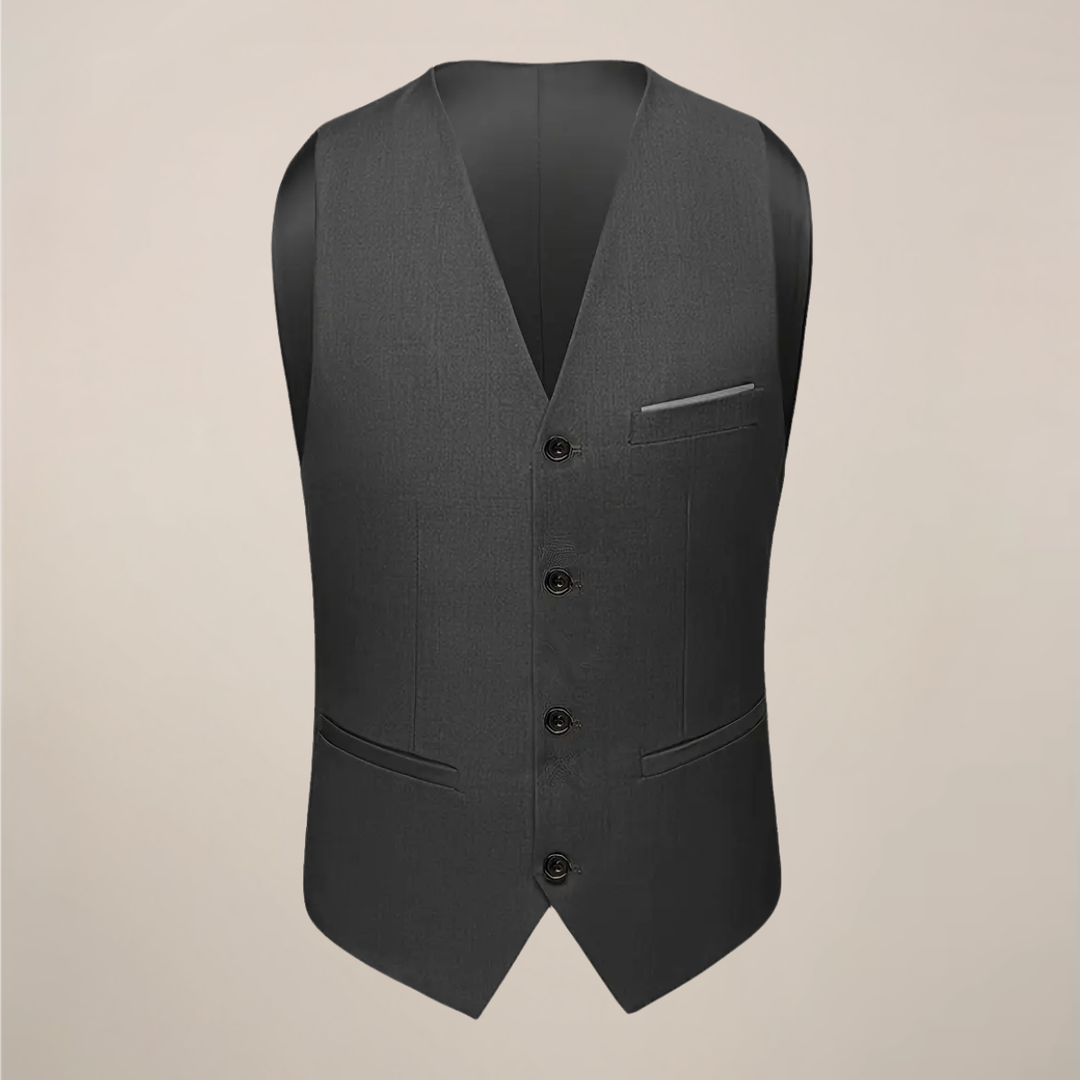 Dark grey slim fit men's three-piece suit. Versatile formal wear for business, wedding, or event.