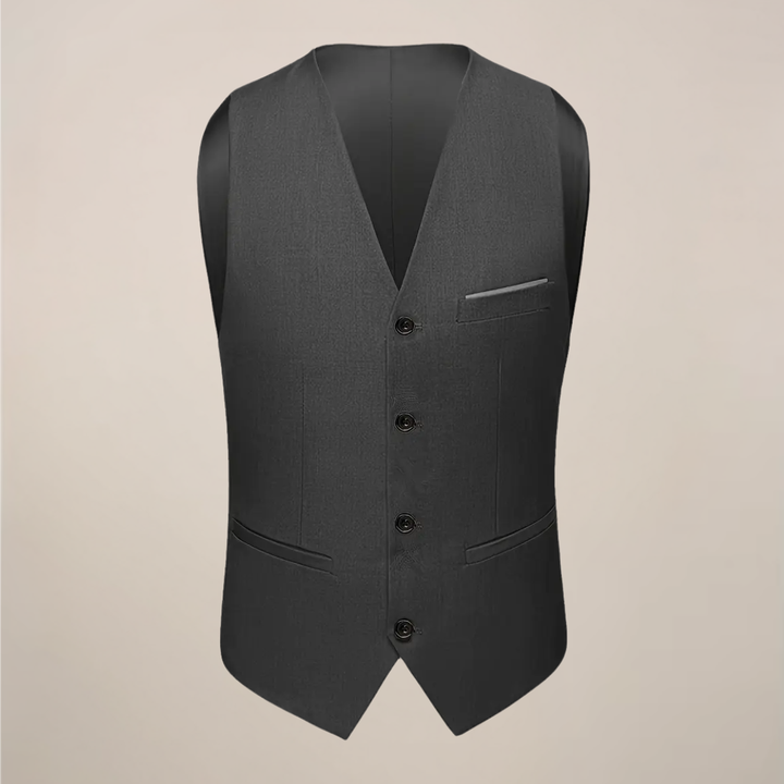Dark grey slim fit men's three-piece suit. Versatile formal wear for business, wedding, or event.