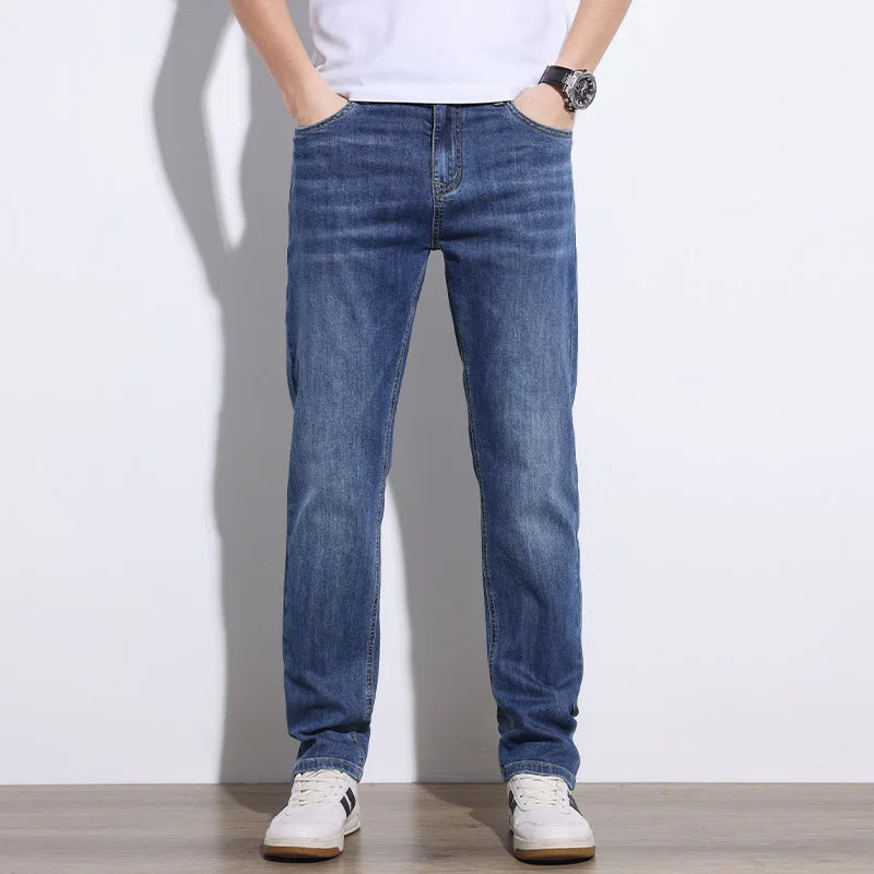 Comfortable men's light blue stretch denim jeans with a relaxed fit for daily wear.
