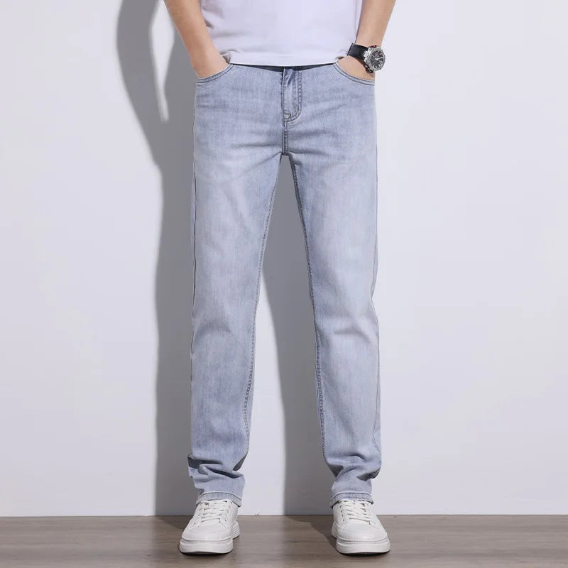 Stylish gray men's stretch denim jeans, offering flexibility and everyday comfort.