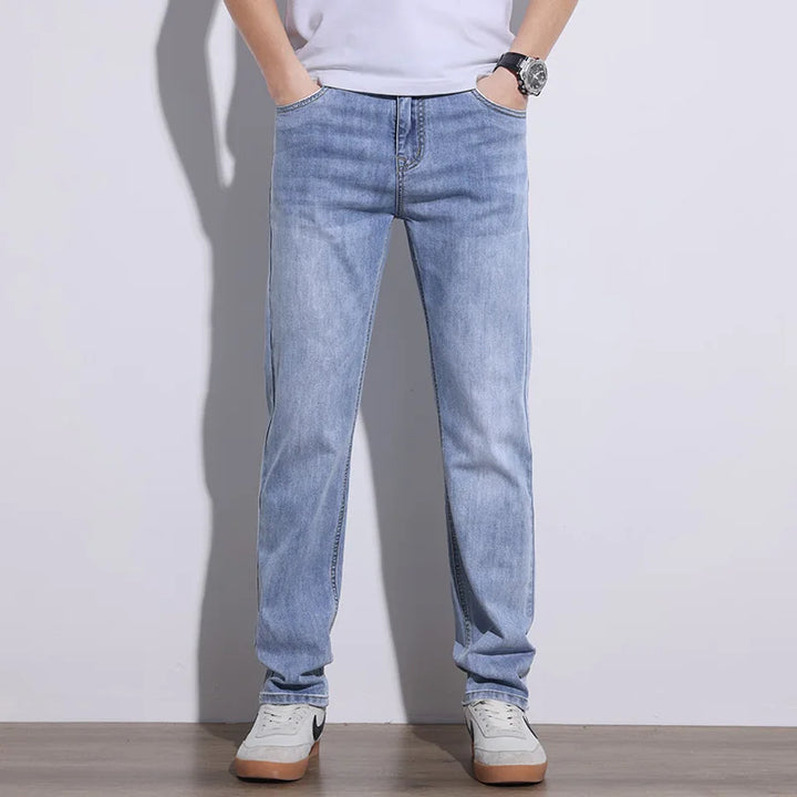 Dark blue men's casual stretch denim jeans, perfect for everyday fashion and comfort.