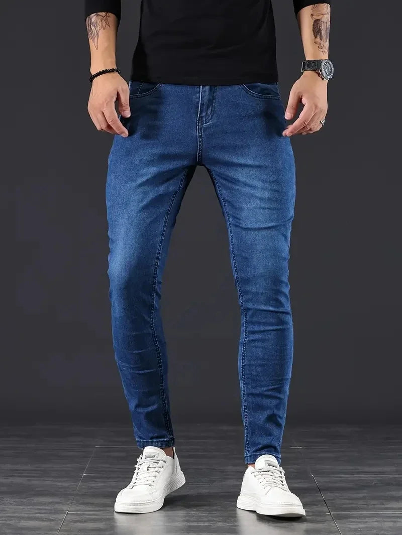 Men's dark wash stretch slim fit jeans, comfortable & modern for everyday wear.