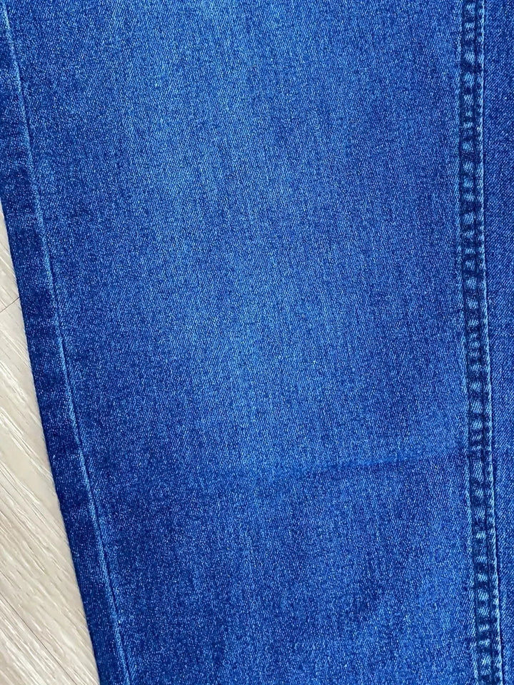 Dark wash men's stretch jeans, slim fit and comfortable, a modern essential for daily wear.