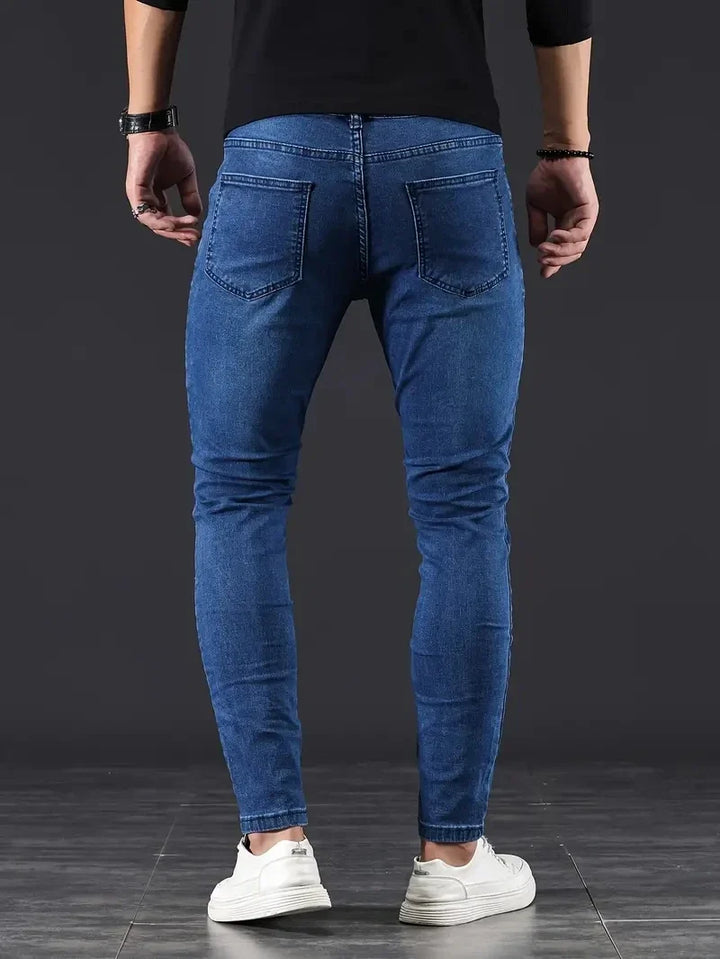 Stylish men's black slim fit stretch jeans, perfect for casual fashion & flexibility.