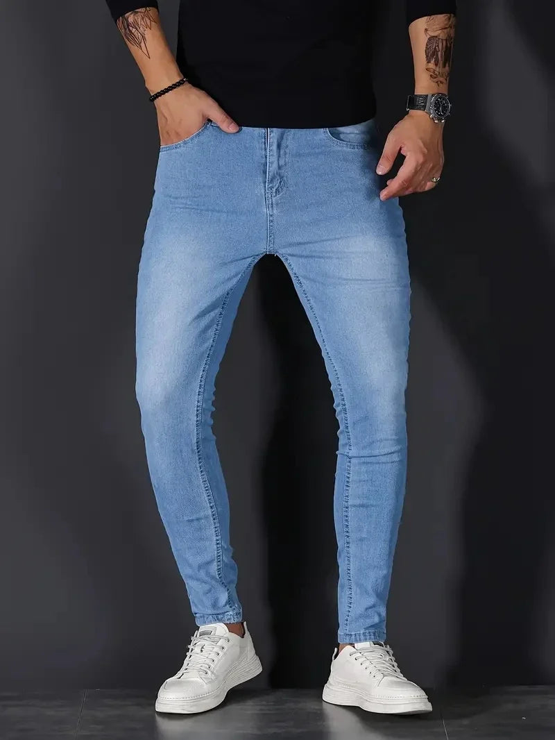 Men's light wash stretch tapered fit jeans, combining modern fashion with ultimate comfort.
