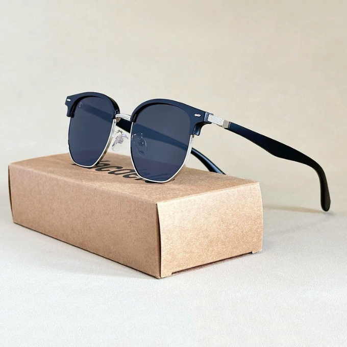 Stylish men's polarized sunglasses with a double bridge design, sleek metal frame, and acetate arms for a modern look.
