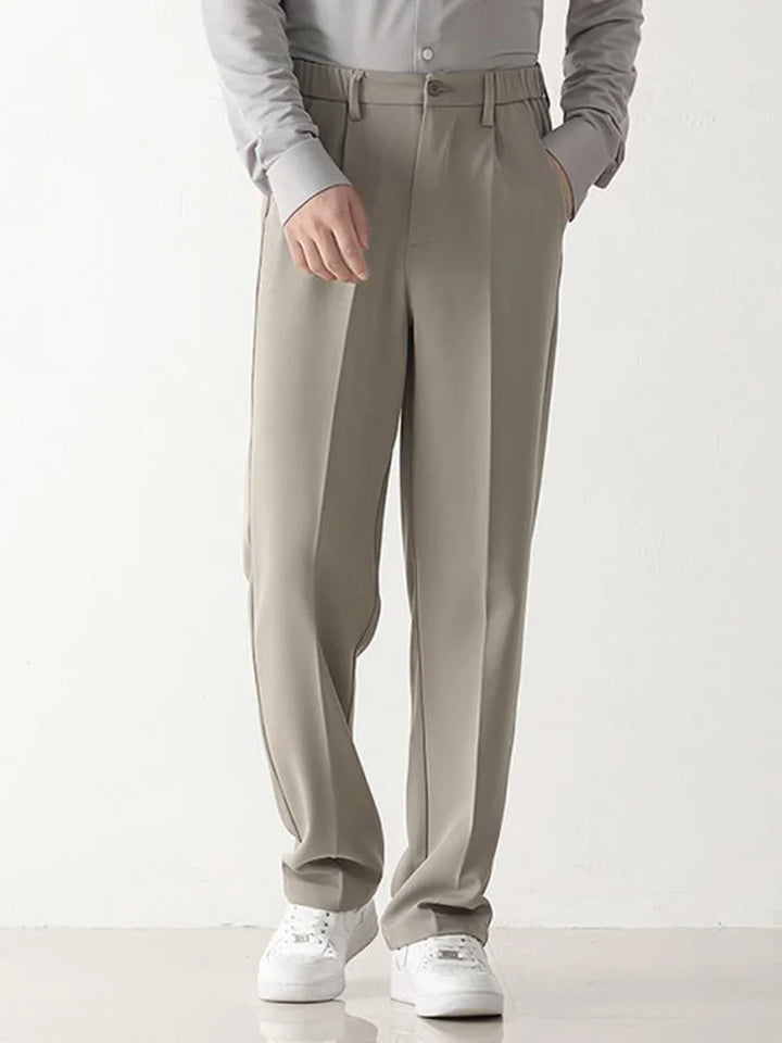 Close-up of elegant draping on men's formal trousers. Stylish dress pants in comfortable polyester blend fabric.