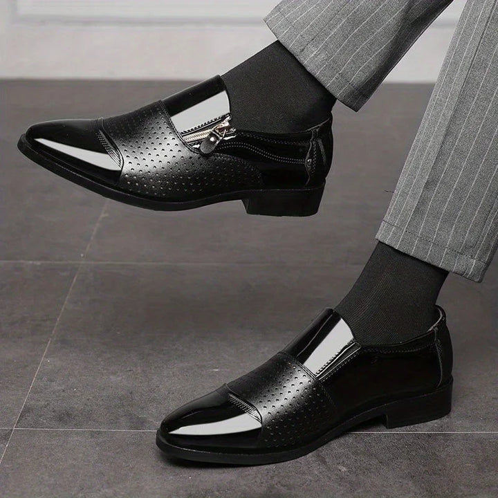 Contemporary men's footwear: dual-texture slip-on loafers with a chic zipper detail.