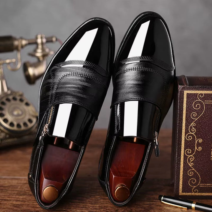 Stylish men's slip-on loafers. Features dual texture, a sleek silhouette, and unique zipper.
