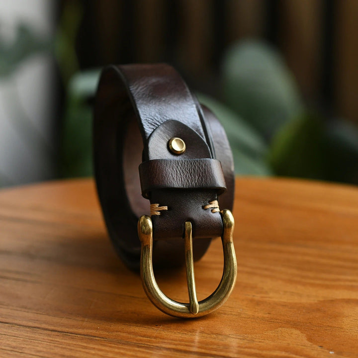Sleek black men's genuine cowhide leather belt, a durable and classic everyday accessory.