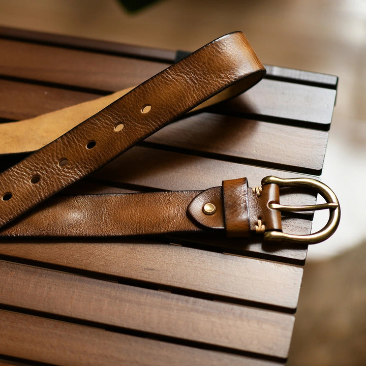 High-quality men's cowhide leather belt, 100% genuine, durable & classic, with polished buckle.