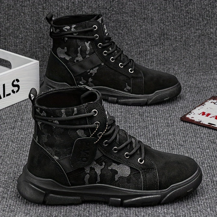 Rugged men's all-terrain tactical boots in black, offering ultimate durability and ankle support for outdoor work.