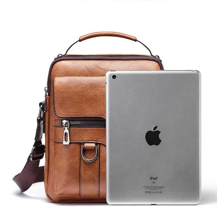 Professional man carrying a sleek black work bag, a durable men's messenger bag with ample storage.