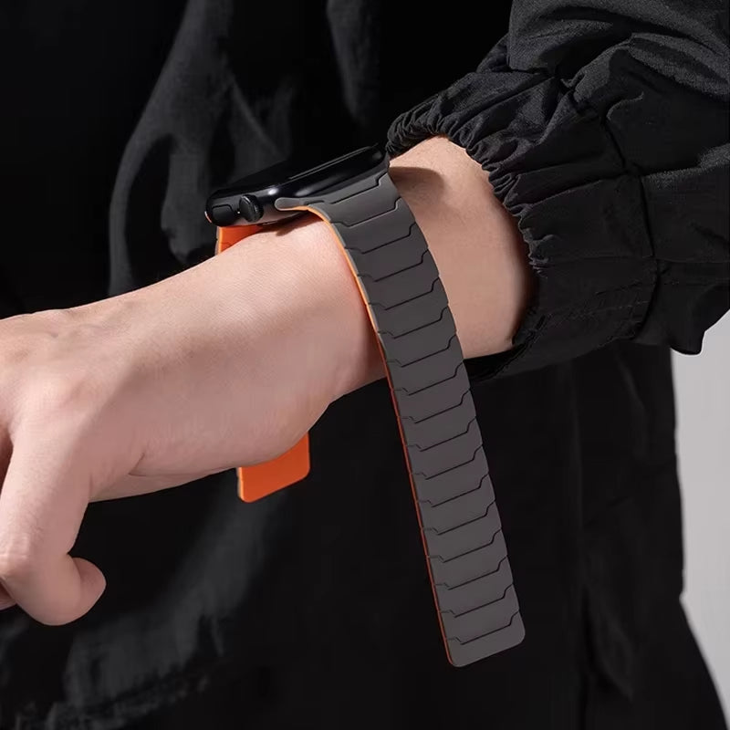 Men's black Apple Watch silicone strap, durable & sweat-resistant, with a strong magnetic closure.