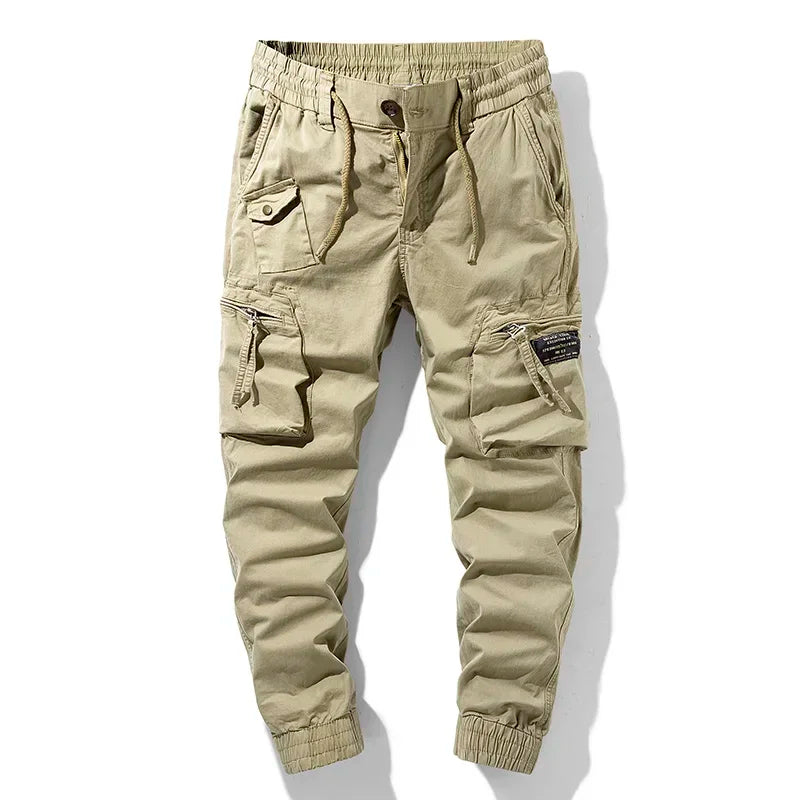 Khaki men's versatile jogger pants for active lifestyles. Durable utility design, comfortable for casual and everyday wear.