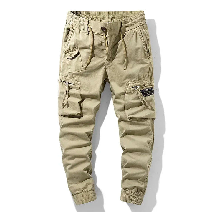 Khaki men's versatile jogger pants for active lifestyles. Durable utility design, comfortable for casual and everyday wear.