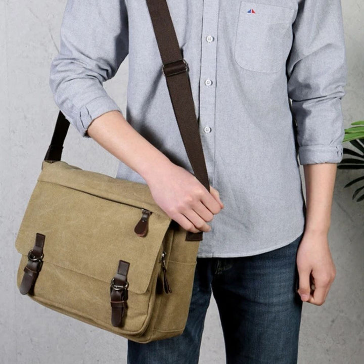 Men's durable canvas messenger bag, a stylish vintage satchel perfect for daily commute & work.