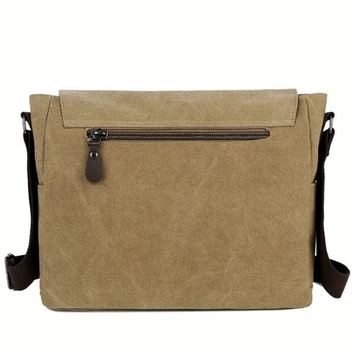 Versatile men's canvas crossbody bag, a shoulder satchel for laptops, commute, & casual use.