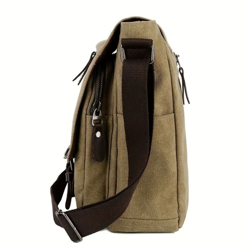 Men's casual canvas shoulder bag, a rugged messenger satchel ideal for daily commute & travel.