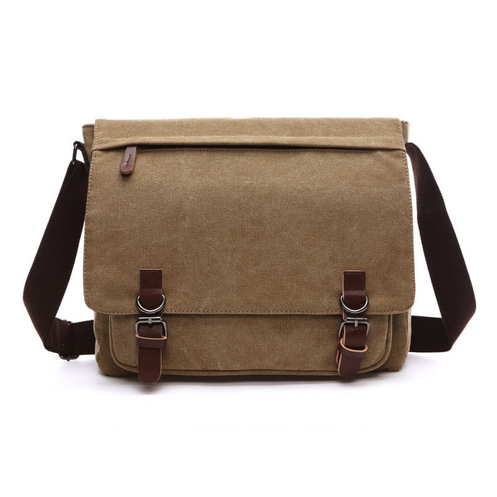 Men's durable canvas messenger bag with stylish buckle straps, perfect for work, travel, or casual use.