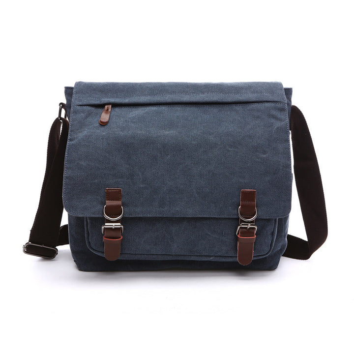 Rugged men's canvas crossbody bag. Durable, versatile, and ideal for daily commute, travel, or school.