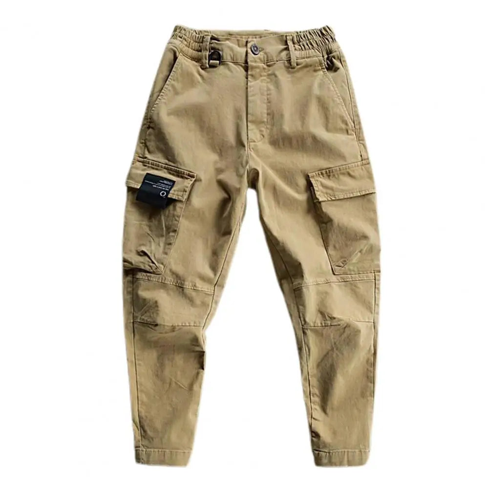 Men's rugged cargo pants for hiking and work, featuring utility pockets and durable fabric.