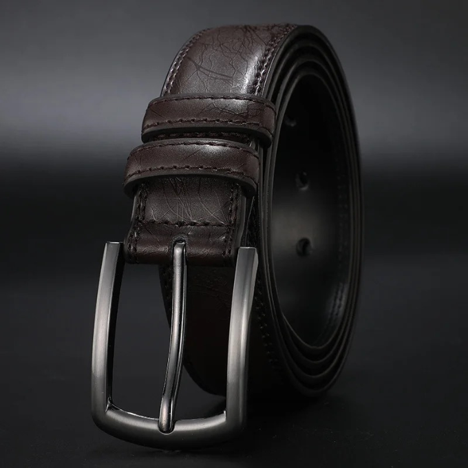 Genuine cowhide leather men's belt featuring a sleek gunmetal buckle; a classic and versatile waist accessory.