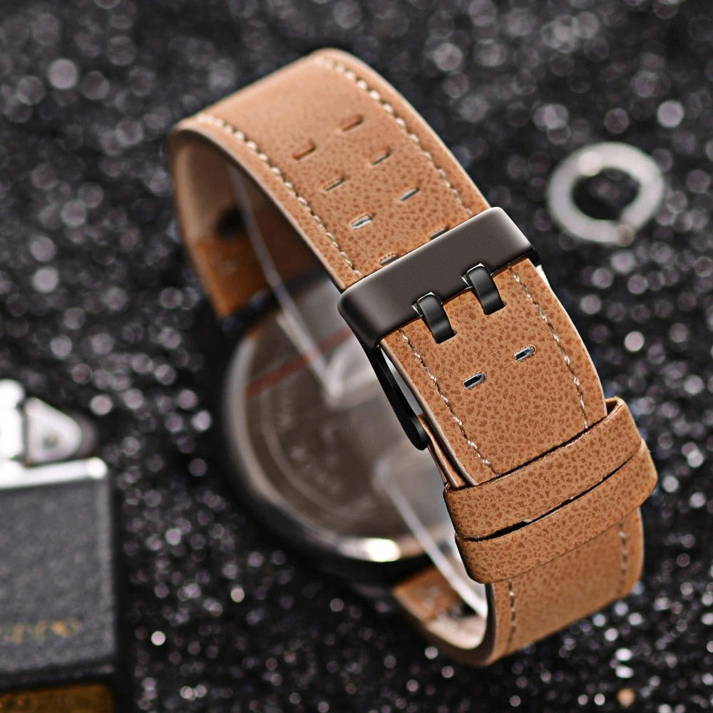 Durable men's timepiece: cowhide leather strap and bold, striking dial. Perfect for a rugged look.