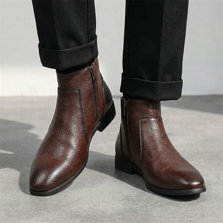 Black men's durable full-grain leather ankle boots, perfect for work & everyday comfort.