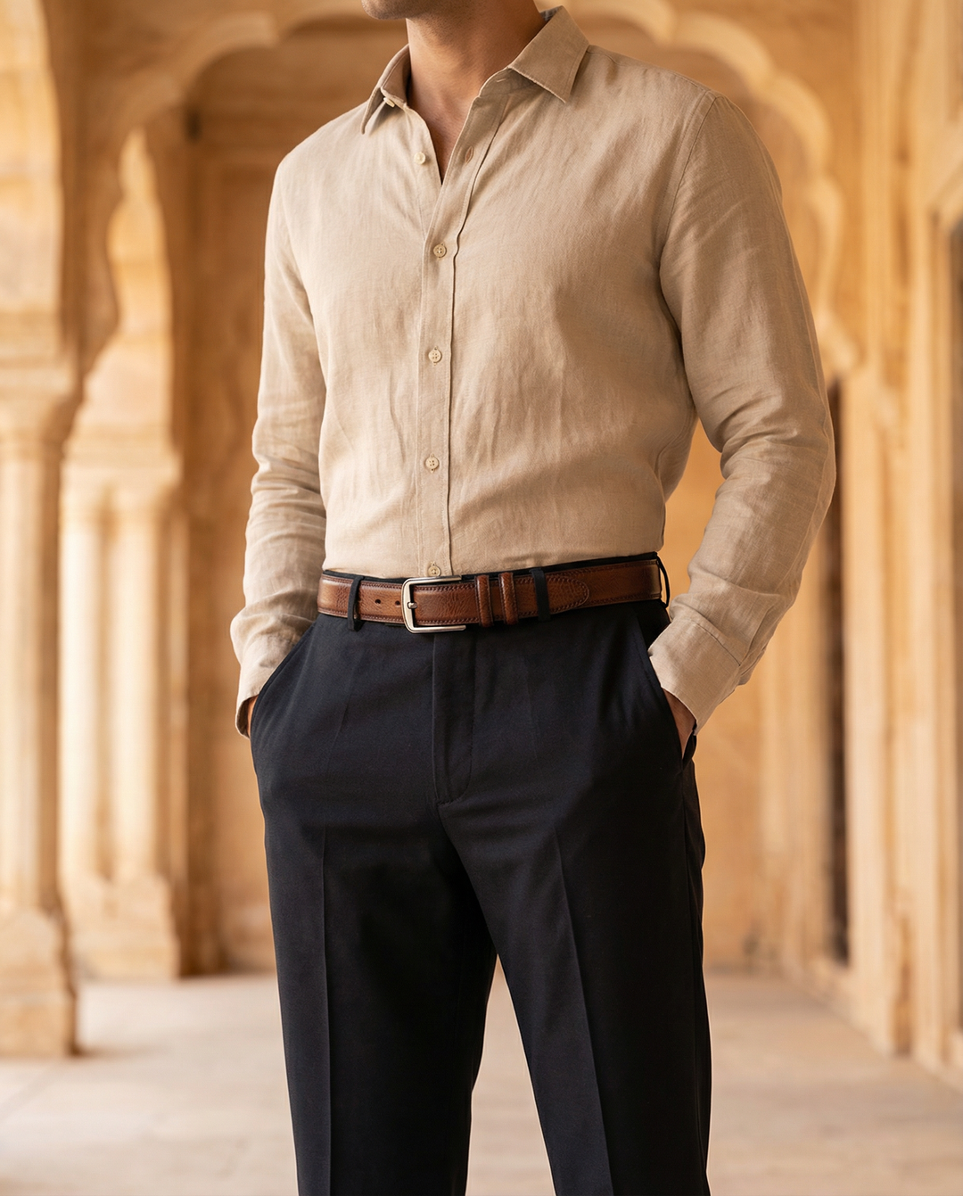 Classic men's full-grain leather belt featuring a polished metal buckle. A durable, stylish, and premium accessory.
