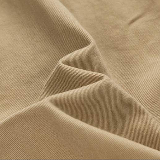 Detail shot of durable fabric on men's cargo shorts, emphasizing rugged quality for adventure & daily use.
