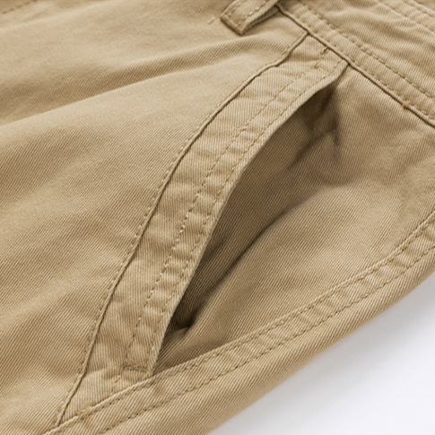 Side view of men's adventure cargo shorts, highlighting comfortable fit & practical design for active men.